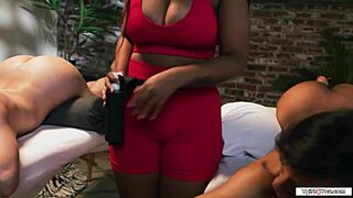 Two tgirls receive oral during interracial massage