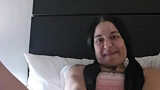 emy angel gently touches and rubs her toy