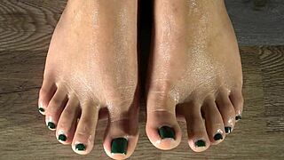 Clean her feet and show green nails close up!