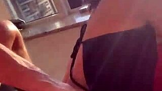 Couple fucks passionately in the building window, letting neighbors watch every thrust and moan.