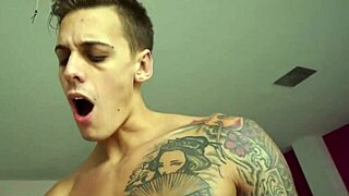 Tattooed Babe Sucks Big Cock in Threesome