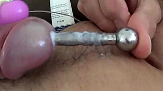 Intriguing sounding on penis leading to cum release