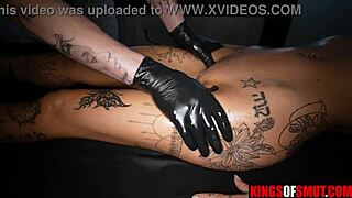 this tattooed brunette is fucking a big cock masseur 😏