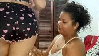 Two latina lesbians foreplaying and humping passionately?