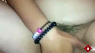 Girl with tattoos eats her own pussy using toys