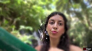 she gets cum on her face in the public locker room, then walks to the waterfall covered in it.