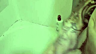 I rubbed my cock in and out under the shower spray