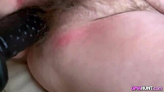 granny pleasures her hairy cunt with toys