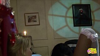 brunette femdom asks, does the busty blonde know how to please with this strapon?