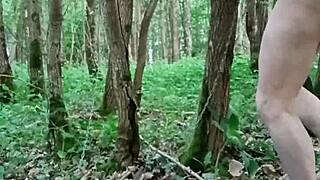 bondage slave performs masturbation in outdoor forest with toys