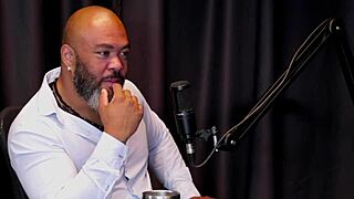 Does the redhead show her ass after husband suggests swinging?