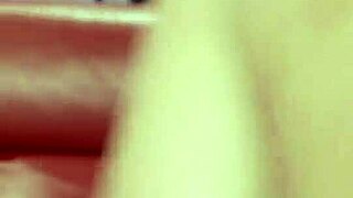 Brunette woman in pantyhose enjoys dual simultaneous pleasures in a group threesome setting.