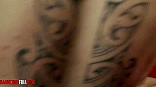 Brunette woman in pantyhose enjoys dual simultaneous pleasures in a group threesome setting.