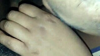 She strokes black cock spit