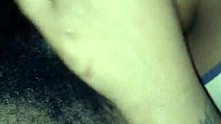 She strokes black cock spit