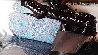 total black with fishnets pantyhose and over the knee boots