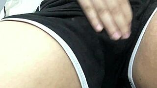 Asian babe masturbates after work.