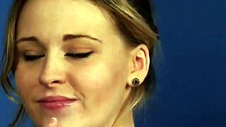 The feisty stunner engages in a blowbang, sucking cocks and receiving cumshots on her face, swallowing all the charge