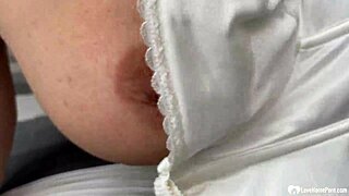 Milf next door teases with big tits and striptease in homemade video