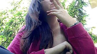 nicoletta lights up in the garden, flashing her big tits