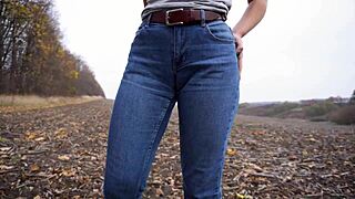 look at this milf teasing her big cameltoe in tight blue jeans outdoors, wanna see more?