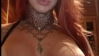 redhead teases fans online with her pink tits in a casual webcam show