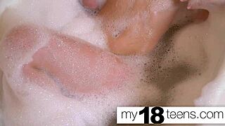 Babe masturbates in bath to close-up orgasm