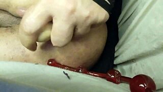 The brunette girlfriend straps on and pegs her boyfriend's tight ass hard