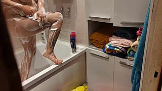 i caught my stepsister in the bathroom. she was bathing with her pussy out.