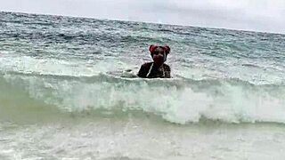 monika fox swims in the sea and fucks her pussy with a big dildo on white sand beach.