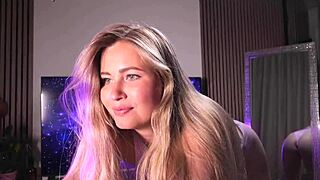 Blonde girl dances in mirror with wet pussy toys