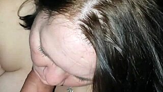 as i relax, she gives a soothing blowjob, sucking my cock gently in the bedroom