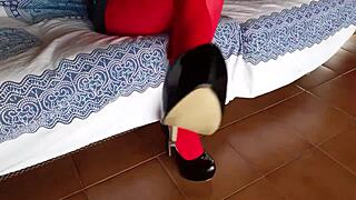 The milf with beautiful legs in red pantyhose and black heels