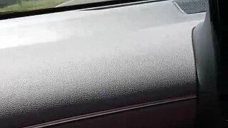 Riding down the road flashing bare tits