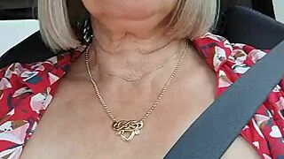 Riding down the road flashing bare tits