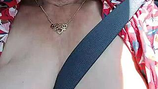 Riding down the road flashing bare tits