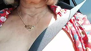 Riding down the road flashing bare tits