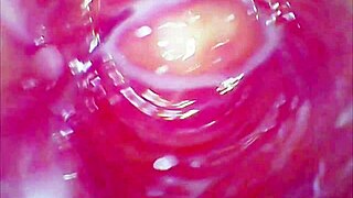 The glass dildo plunges deep into the tight juicy pussy, creating a homemade roller coaster of pleasure.