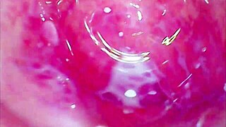 The glass dildo plunges deep into the tight juicy pussy, creating a homemade roller coaster of pleasure.