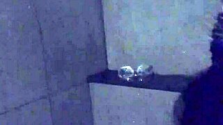 Intense Pleasure Overwhelms Asian Wife in Gym Shower with Toys