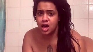 Fresh Face And Bare Ass Fucking Herself In The Shower