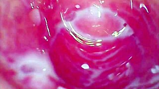 The glass dildo plunges deep into the tight juicy pussy, creating a homemade roller coaster of pleasure.