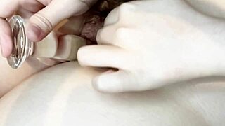 The glass dildo plunges deep into the tight juicy pussy, creating a homemade roller coaster of pleasure.