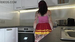 Why is the hottest redhead tattooed cheerleader flashing her see-through panties in the kitchen with those over-knee socks?