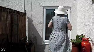 Naughty girl strips naked in the garden