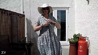 Naughty girl strips naked in the garden