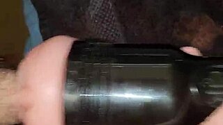 guy strokes big cock in fleshlight during voyeur session