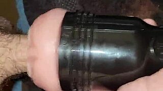 guy strokes big cock in fleshlight during voyeur session