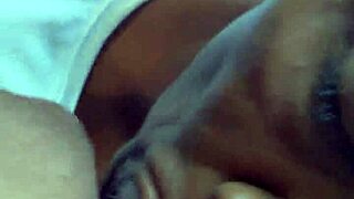 A black granny with big tits sucks monster cock.