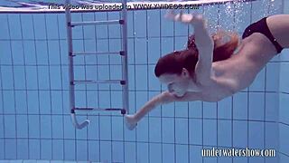 Lucy takes off bikini in the pool